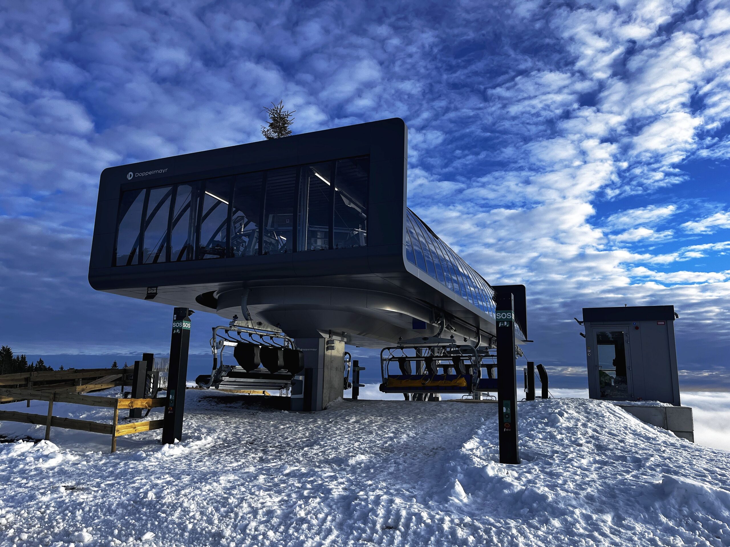 New mountain station of the Fellbergbahn cable car in Steinach in the snow during the acceptance inspection of the cable car