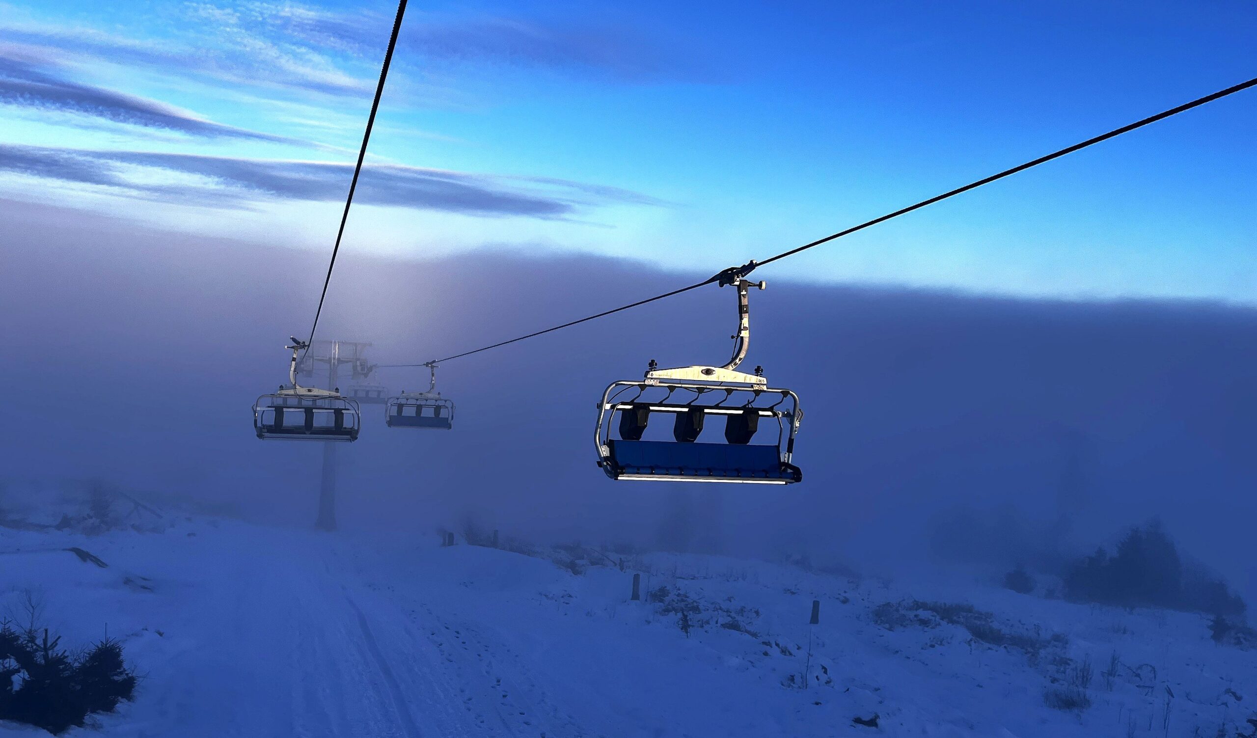Fellbergbahn Steinach chairlift in the blue twilight in the snow