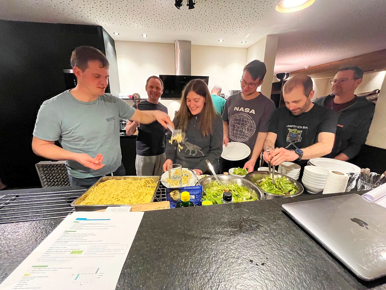 ROTEC colleagues in good spirits at a shared dinner buffet