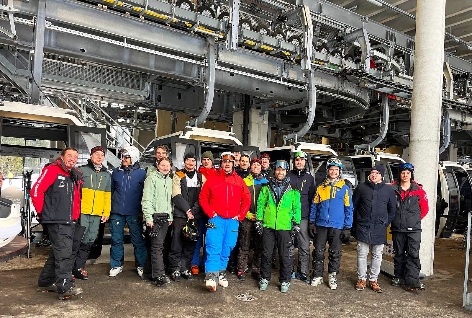 The entire ROTEC team poses at the cable car station in the Silvretta Arena